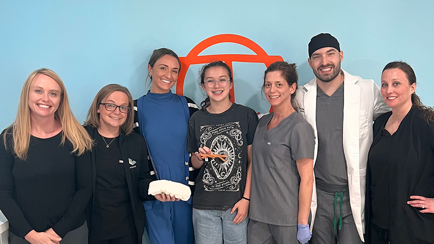 Dr Zack Bracket and the team with the first patient at The Orthodontist
